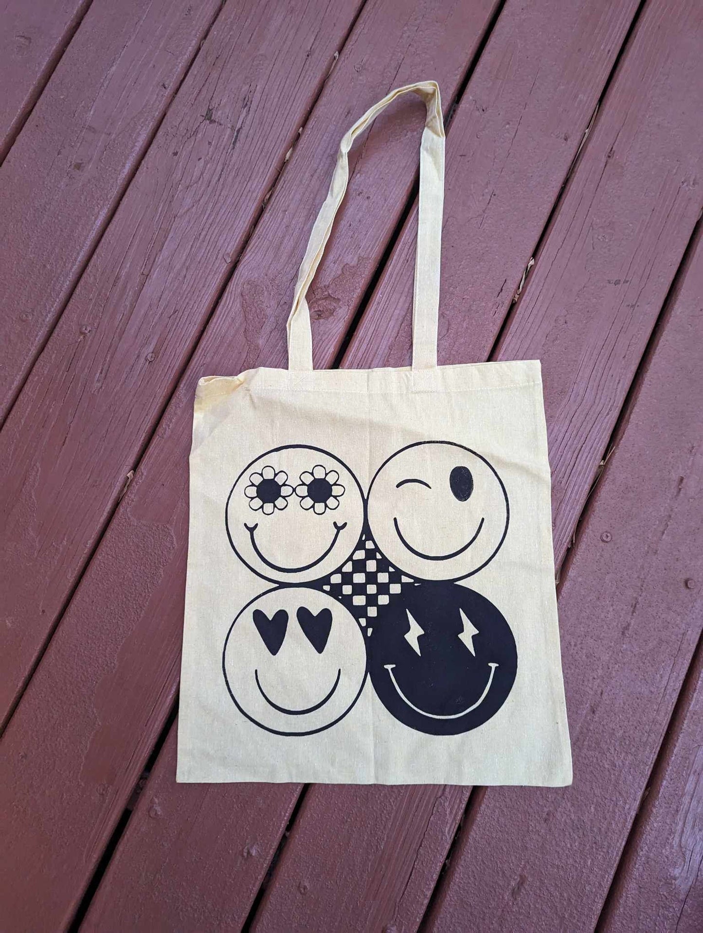 Colored Tote bag with smiley face print